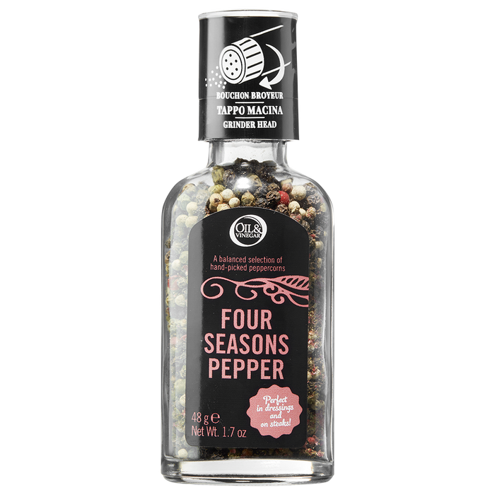 A clear glass bottle with a grinder cap containing a blend of black, white, green, and pink peppercorns, labeled 'Four Seasons Pepper'.