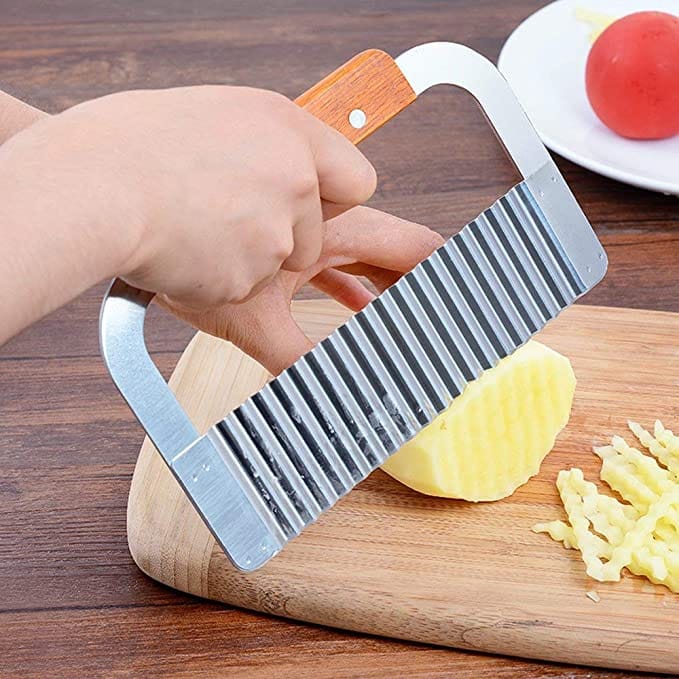 Royal Industries Stainless Steel Serrator 7 inch with Wood Handle This kitchen tool features a highly durable construction which is perfect for commercial use. ROY GR 230 Hannah's Variety Store