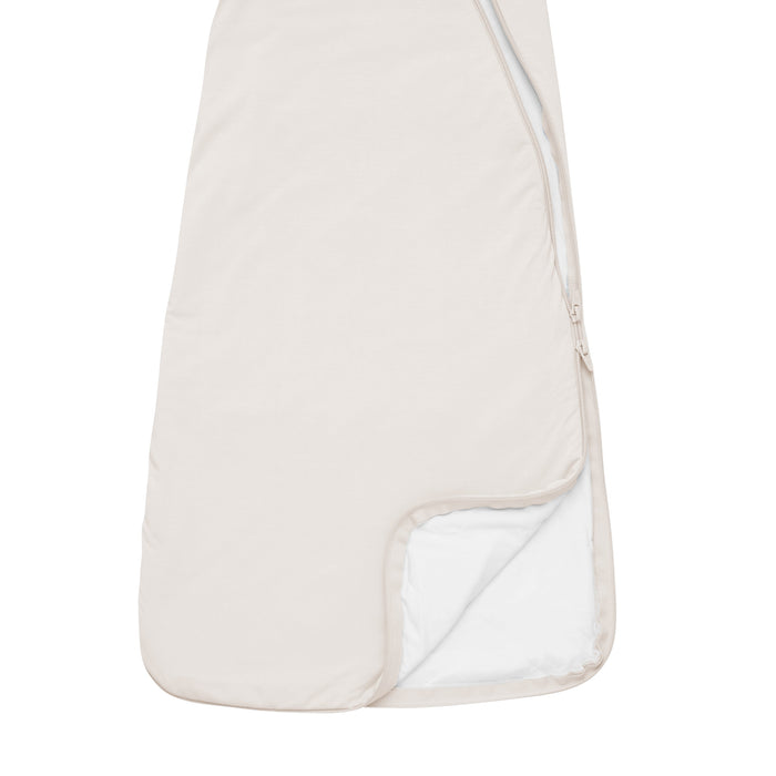 Double zipper on Kyte Baby Slumber Bag in Oat
