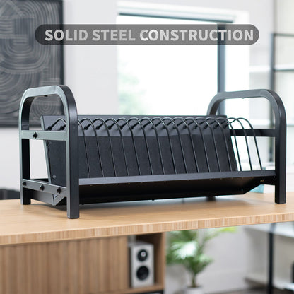Black charging rack on a wooden surface with text overlay.