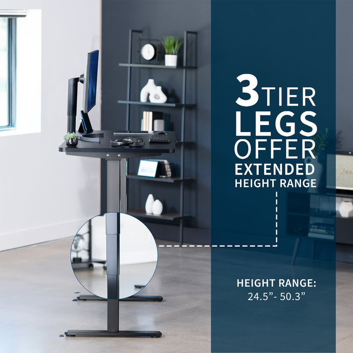 Black adjustable desk with a 3-tier leg design in an office setting