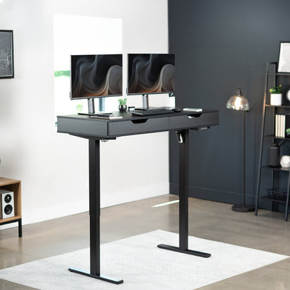 Black shelf with a drawer in a modern office.