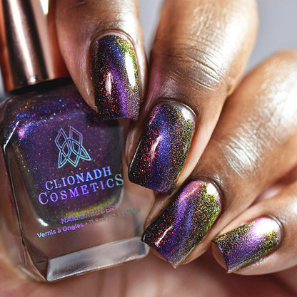 Close up of nails done on deep skin tone with Acid Rain nail lacquer