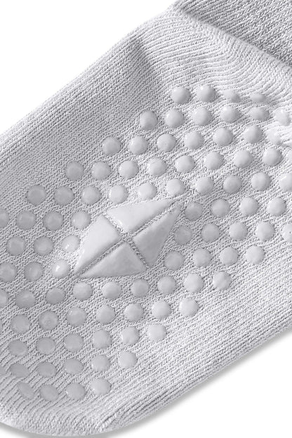 Bottom of a Kyte sock with grips.