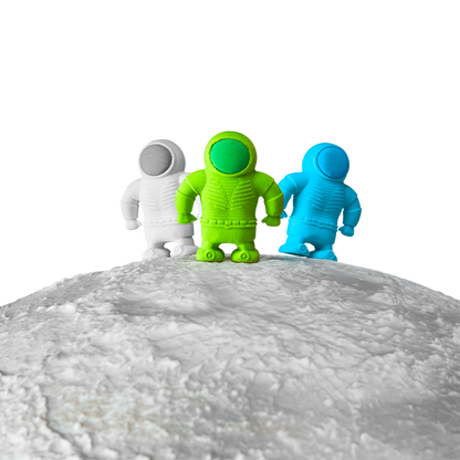3 Astronaut Erasers shown standing on a planet top edge