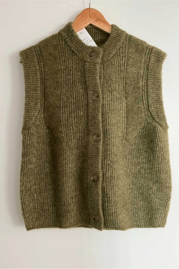 Atelier Rêve Irsilvi Waistcoat, crafted in a cosy moss melange green knit. Available at Dotique Witney
