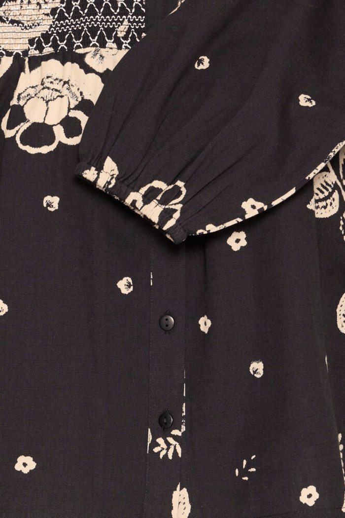 Atelier Rêve IRTULLA black cotton blouse with pink floral design at Dotique