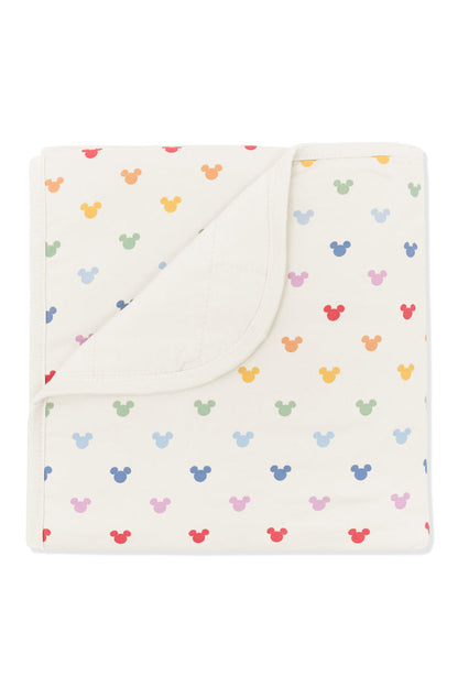 Baby Blanket with pastel mickey mouse pattern on an oat background