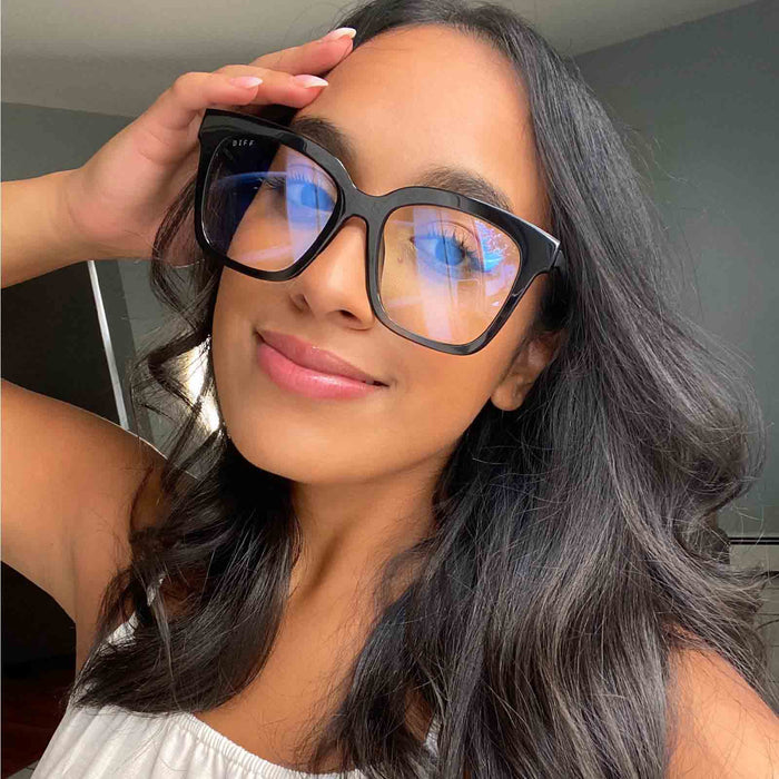 customer content - female wearing diff eyewear bella square glasses with a black frame and prescription lenses