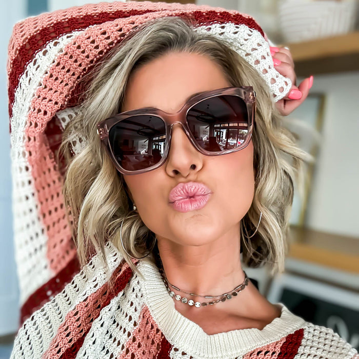 lifestyle - kalee_rogers wearing diff eyewear bella square sunglasses with a light pink crystal frame and wine gradient lenses