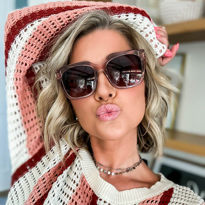 lifestyle - kalee_rogers wearing diff eyewear bella square sunglasses with a light pink crystal frame and wine gradient lenses