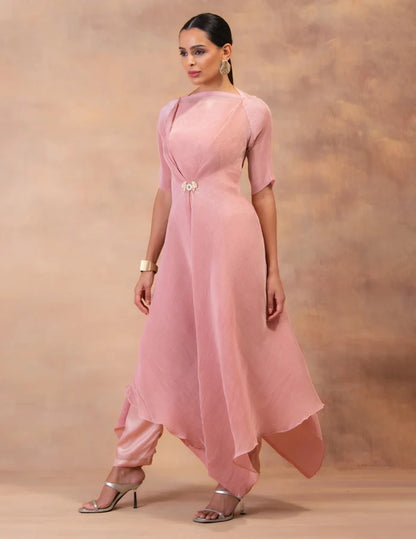 Model wearing the 'BLUSH PINK' layered tunic drape-dress set with matching pants, crafted in micro-pleated georgette satin with gold foil detailing in Singapore.