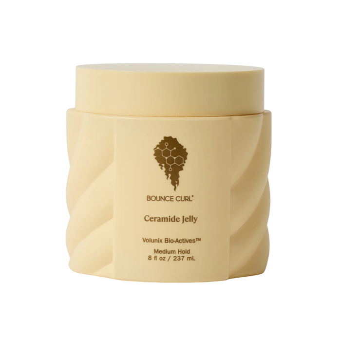 Beige jar of Bounce Curl Ceramide Jelly weightless collection on a white background