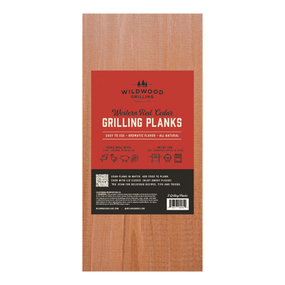 Wooden grilling plank with red label featuring Wildwood Grilling branding.