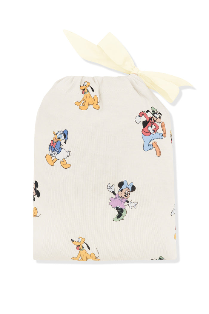 Change pad cover in mickey mouse and friends print shown in its packaging