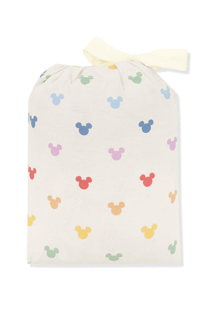 Change pad cover in pastel mickey mouse icons shown in its packaging