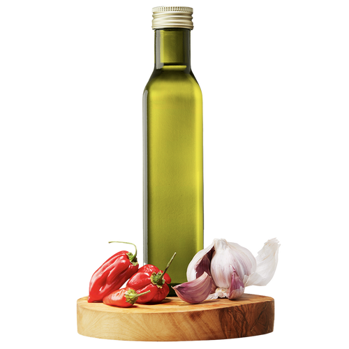 A bottle of extra virgin olive oil on a wooden board with a chili pepper and garlic to the right of the bottle.