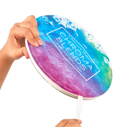 Person demonstrating how to open Chroma Blends Circular Watercolor Paper with a letter opener