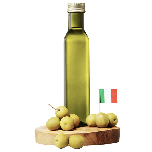 A bottle of Puglia Extra Virgin Olive Oil with olives in front and an Italian flag to the side, all presented on a wooden board.