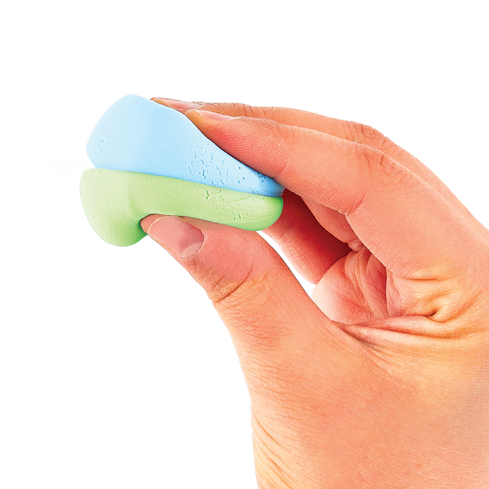 Hand holding light blue and green clay together from OOLY Creatibles Deluxe Air Dry Clay Kit