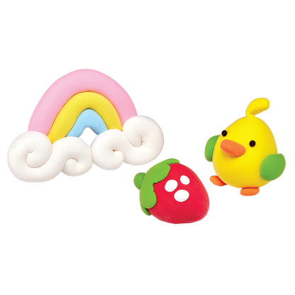 Set of finished creations including a rainbow, strawberry, and duck made with OOLY Creatibles Standard Air Dry Clay Kit on a white background