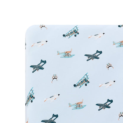 Close up of the Crib Sheet in Take Off on a mattress