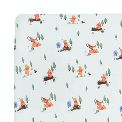 Close up of the Crib Sheet in Winnie the Pooh Hundred Acre Wood on a mattress