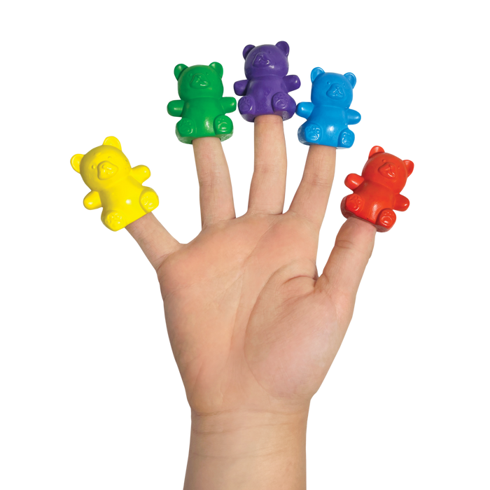 Child's hand with Cuddly Cubs bear finger crayons on fingers