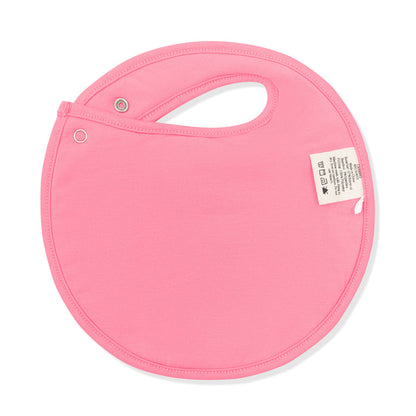 The pink colored backing on the Cushy Bib in Tulip