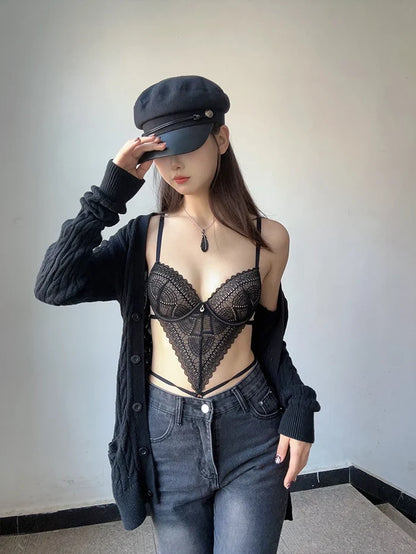 Black lace bralette set styled with oversized cardigan and baker boy hat