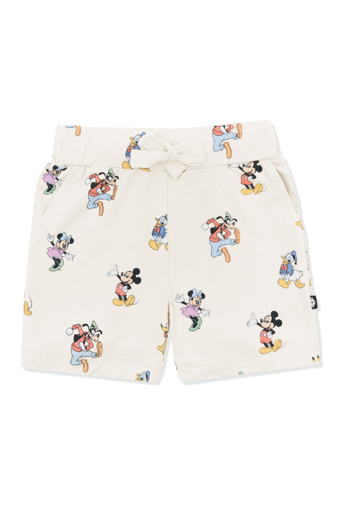 Drawstring short with mickey mouse and friends print on an oat background