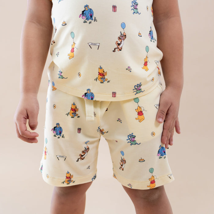 Close up of the Drawstring Short in Winnie the Pooh Celebration on a young model