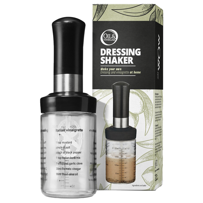 A clear dressing shaker with a black shake handle, displayed alongside its packaging which has 'DRESSING SHAKER' text and recipes written on it.