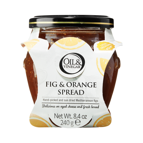 A glass jar of Dried Fig & Orange Spread with a white label that includes the brand 'Oil & Vinegar' and product name. The jar is filled with figs and visible pieces of orange, indicating the flavor of the spread.