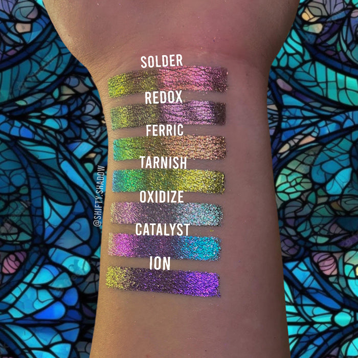 Wrist swatches of Solder, Redox, Ferric, Tarnish, Oxidize, Catalyst and Ion on fair skin tone.