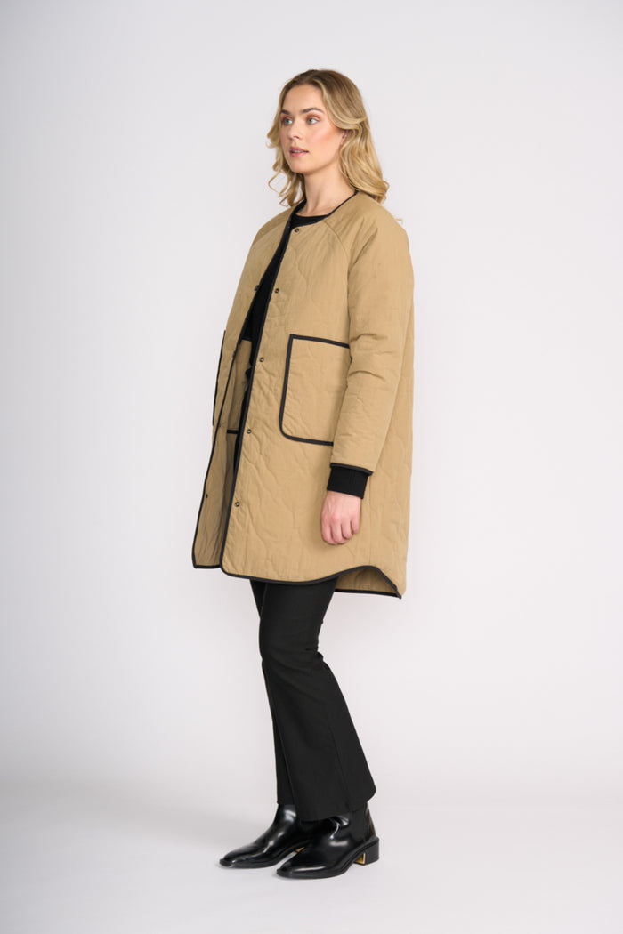 Model wearing Foil FO8388 Hidden Talent Reversible Coat Black & Tan. Shop Foil at Dotique