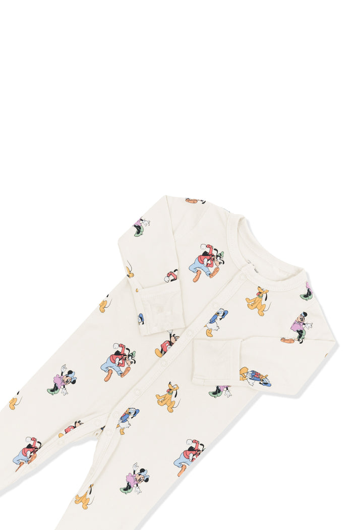 Top part of footie in mickey mouse and friends print on an oat background