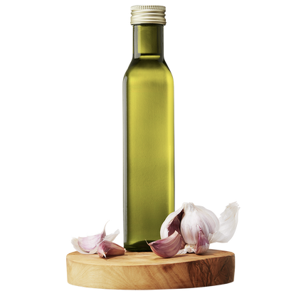 A bottle of Garlic Extra Virgin Olive Oil on a wooden platform with whole garlic cloves around it.