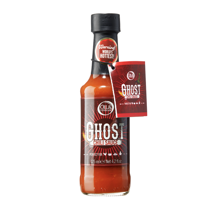 A bottle of Ghost Chili Sauce with a label indicating it is a spicy condiment made with Ghost Chili peppers.