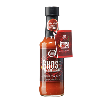 A bottle of Ghost Chili Sauce with a label indicating it is a spicy condiment made with Ghost Chili peppers.