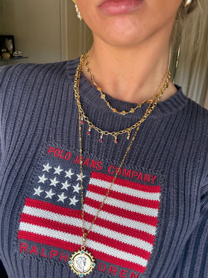 Cool jewellery stack with chunky gold necklaces