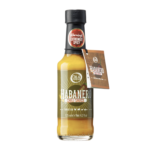 A bottle of Habanero Chili Sauce with a label and a brown cap