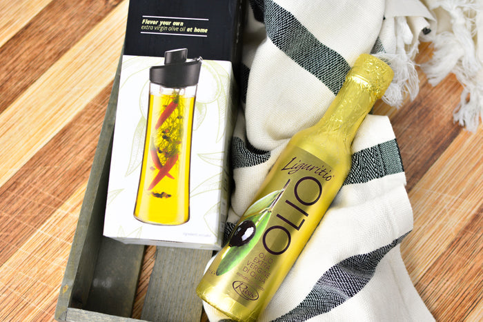 Herb Oil infuser and 250ml gold olive oil bottle in a wooden crate