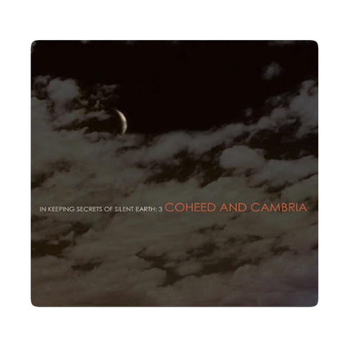Cd cover that shows a dark night sky with clouds across the image.  There is text that reads In Keeping Secrets of Silent Earth: 3 and Coheed and Cambria as well.  There is a white border around all of this.