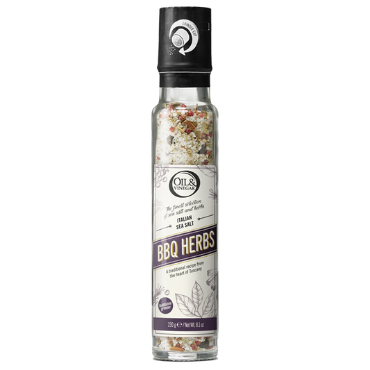 A tall, slender container of Italian sea salt with BBQ herbs, featuring a black cap and a label that showcases the product name and the brand, Oils & Vinegar. The container is filled with a mix of sea salt and herbs, some of which are visible at the bottom.