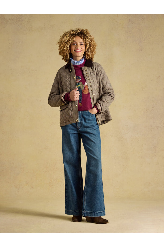 Smiling model in Joules Harrogate Check Coat Shop Joules at Dotique