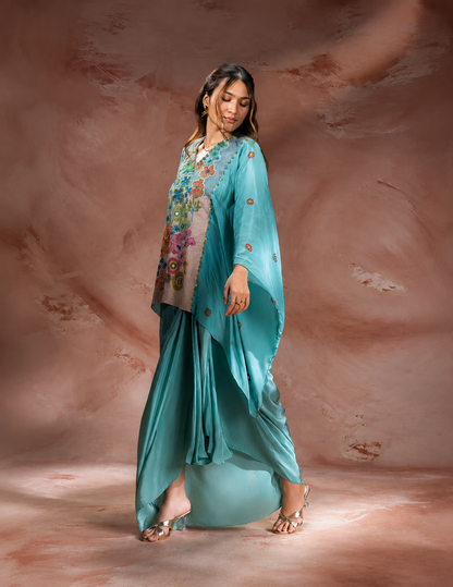 Blue Kaia embroidered kaftan-style top with waist tie-up paired with a flowing crepe drape skirt for women, perfect for festive and contemporary occasions.