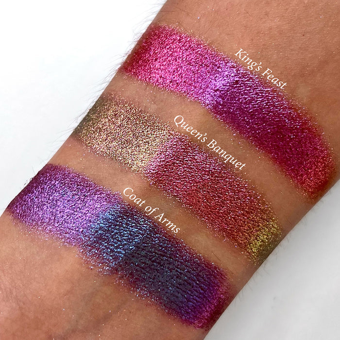 Top angled arm swatches on medium skin tone of King's Feast Hybrid Multichrome Pigment shifts compared to Queen's Banquet and Coat of Arms