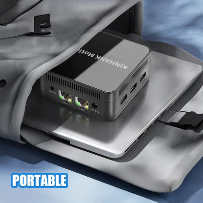 Portable computer device on a gray surface with 'KINHANK MotionX' branding.