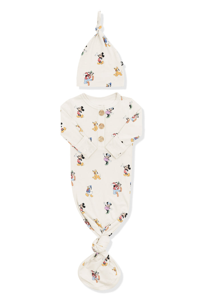 Front of Knotted Gown with Hat Set in Mickey Mouse and Friends print on an oat background